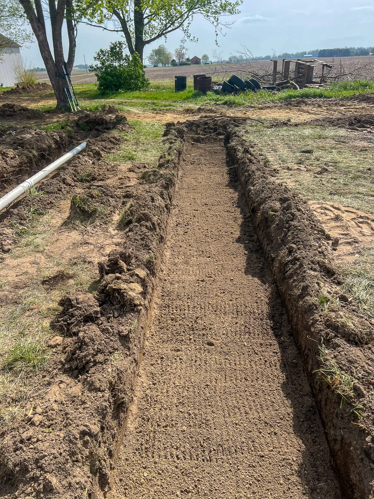 Fresh trench cut for farm tile drainage